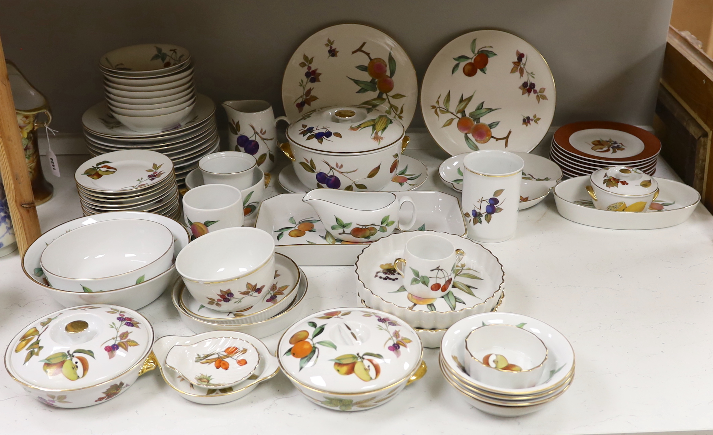 A large quantity of Worcester Evesham dinnerware, including; plates, bowls, serving dishes, jugs, flan, dishes, etc. (70 pieces)